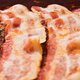 Illustration for article titled Bacon Was the First Thing Ever Eaten on the Moon